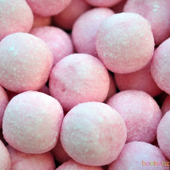 Boules citriques roses goût fraise - bonbons durs à sucer